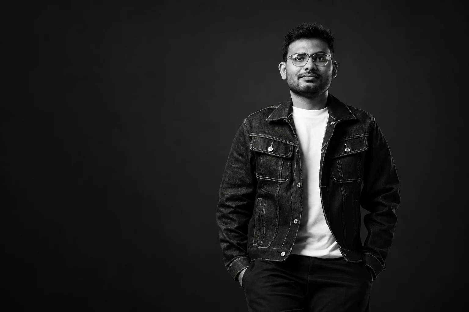 Tenny Jesse in a black-and-white studio portrait